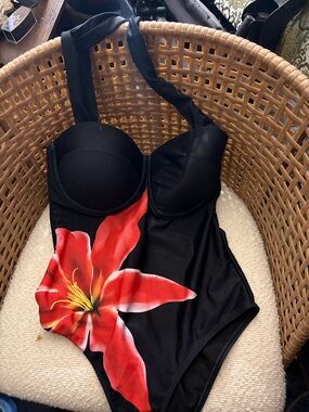Black One-Piece Swimsuit with Bold Red Lily